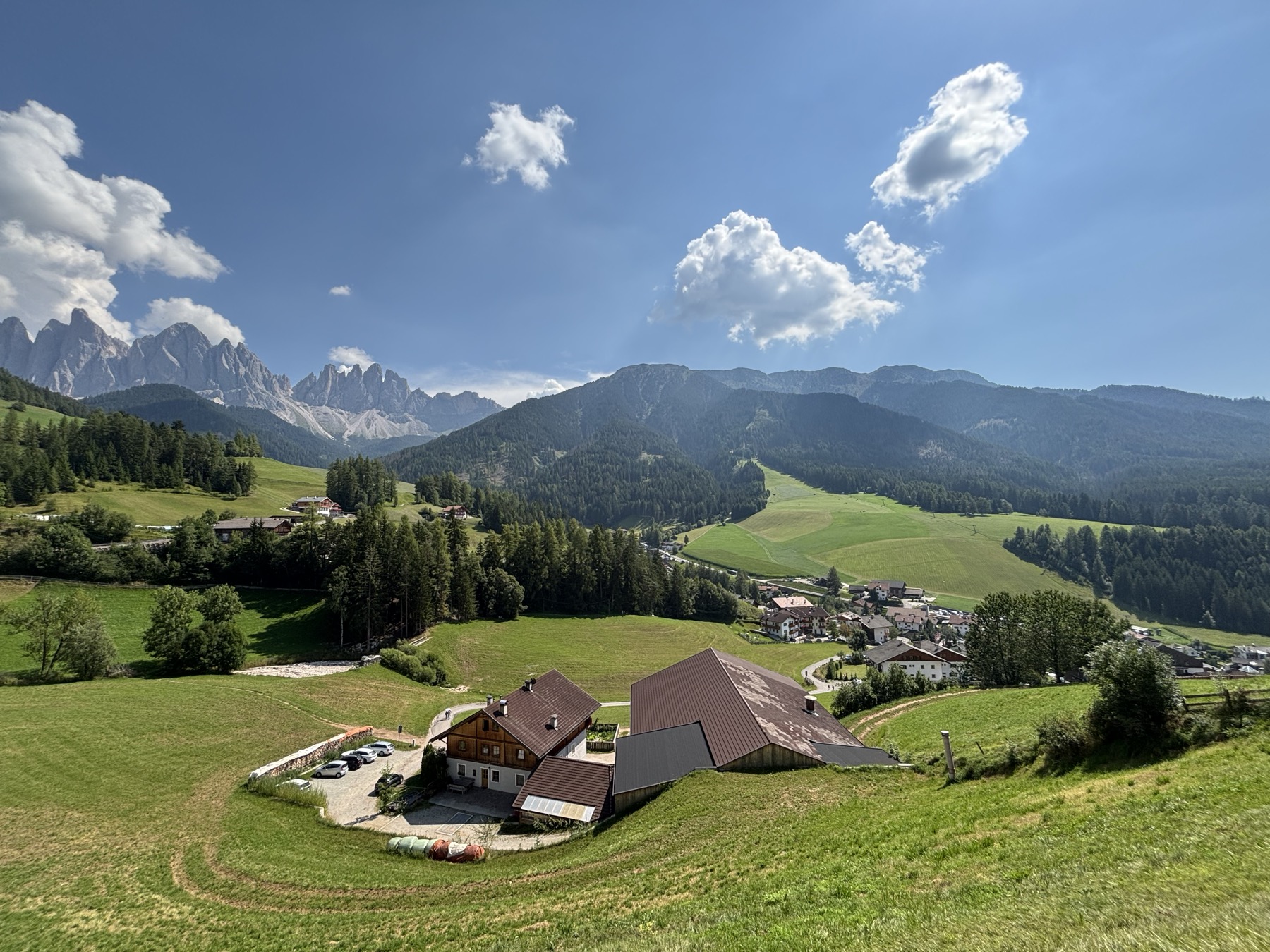 St. Magdalena village shrine with Dolomite peaks behind